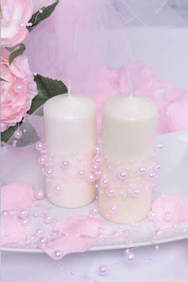 Różowa perełka w girlandzie komunijnej